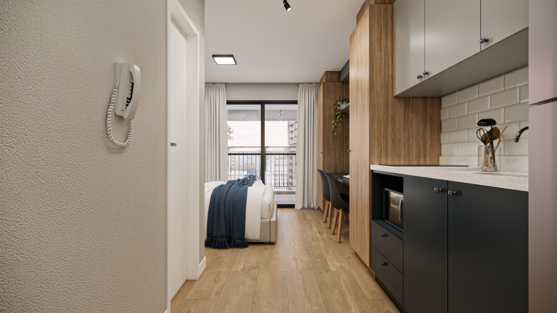 Apartamento de 27,46 m² reformado pela Bewild no Collection Moema: ambiente integrado com cozinha, cama e painel de marcenaria