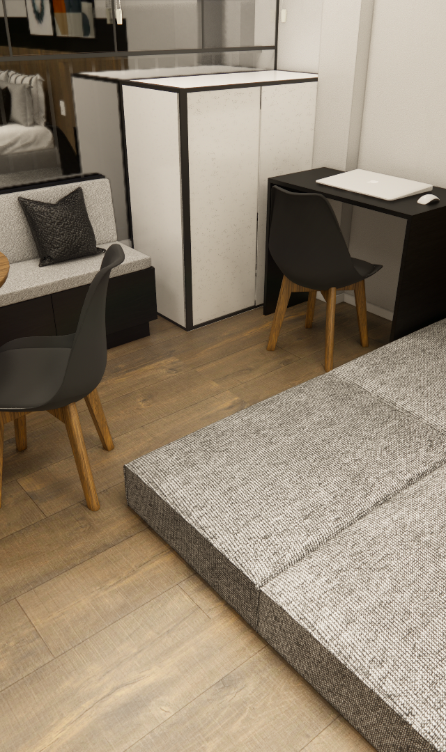 Render 3D de estúdio de 30m² com banco estofado cinza, mesa redonda de madeira, bancada de trabalho preta e piso amadeirado