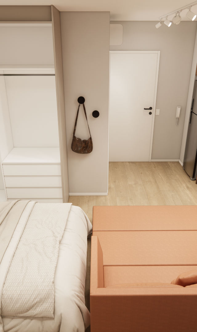 Render 3D de estúdio no Butantã com cama, armário branco, cozinha em madeira, sofá terracota e mesa de trabalho integrada