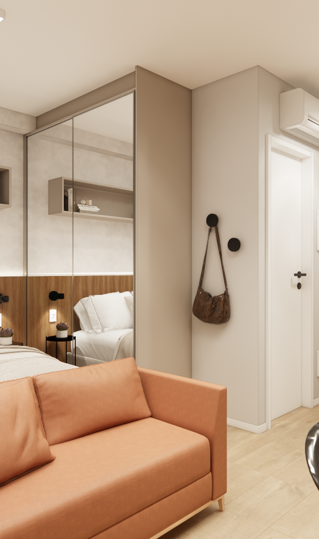 Render 3D de estúdio compacto no projeto Vital Home com sofá terracota, cama, espelho, marcenaria em tons neutros e amadeirados