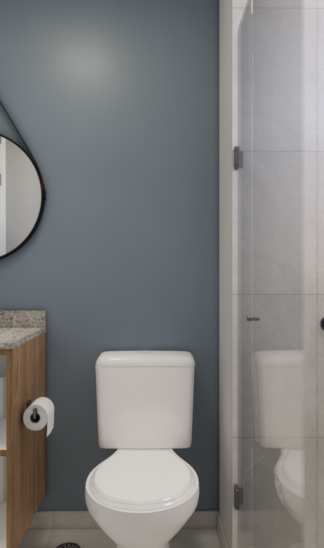 Render 3D de banheiro moderno no FC THINK TANABI, com parede azul, espelho redondo, bancada em granito e box de vidro