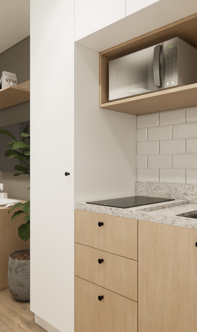 Render de cozinha compacta e escritório com marcenaria em madeira clara, bancada em granilite e azulejos brancos tipo metrô