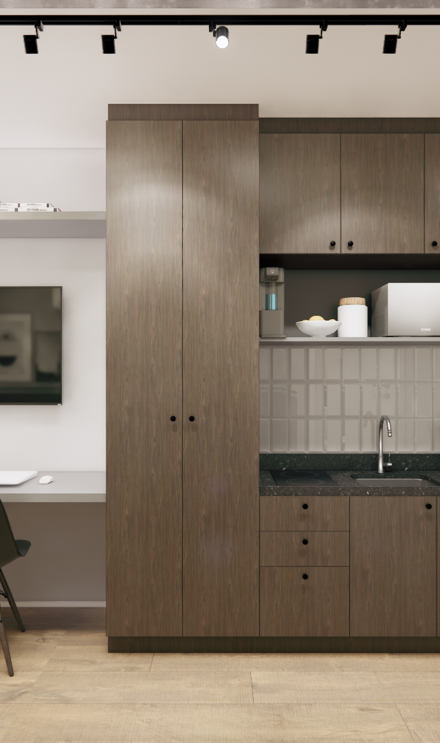 Render 3D de estúdio com marcenaria em madeira escura, bancada de trabalho, cozinha compacta e iluminação em trilho preto