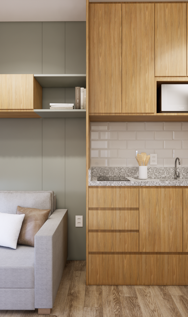 Render de estúdio 28 m² com sofá cinza, parede verde, marcenaria em madeira clara, bancada em granito e geladeira inox