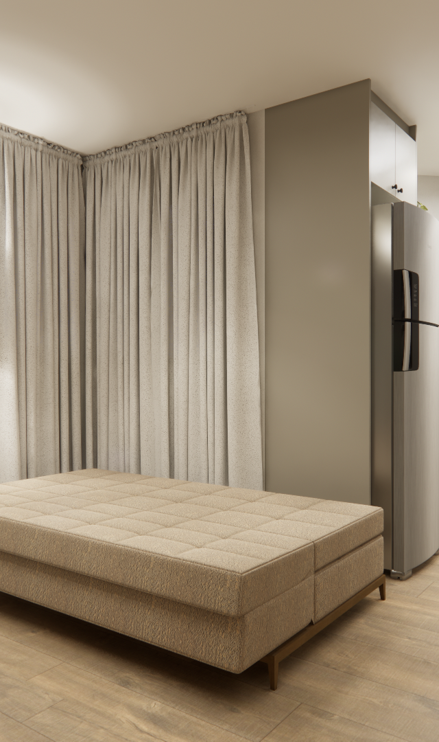 Render 3D de estúdio com sofá bege, cozinha integrada em tons claros, bancada preta e varanda com poltrona preta