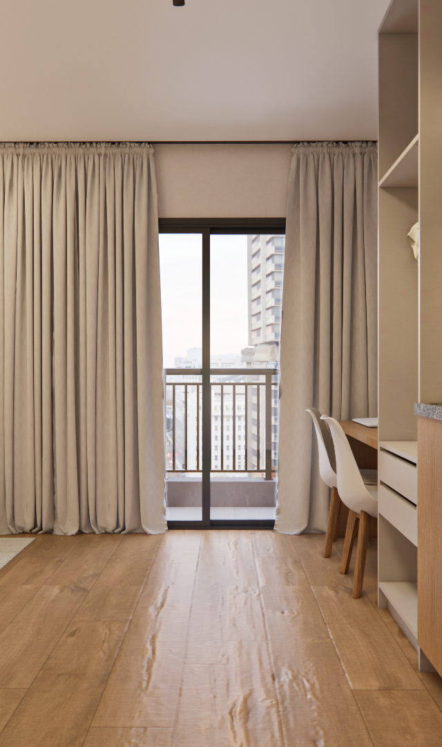 Render 3D de estúdio no NEX ONE PEREIRA COUTINHO com marcenaria em madeira clara, cozinha compacta e varanda integrada