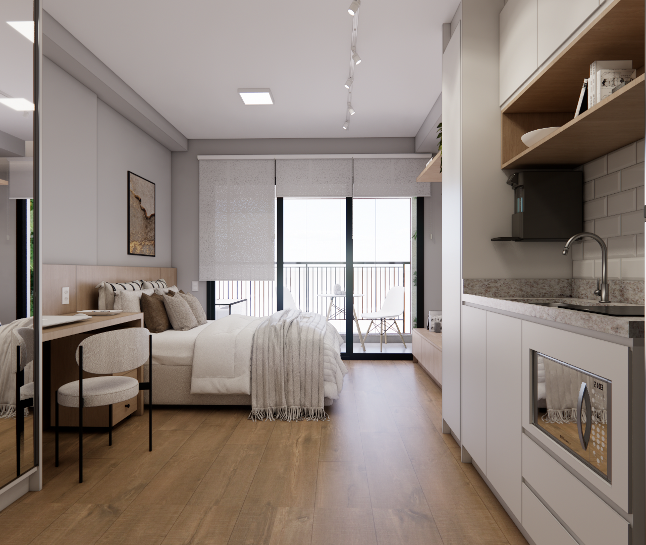 Cama ao lado de cozinha cinza com módulos amadeirados, apoio de refeições e porta de vidro levando à varanda.