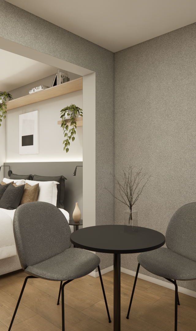 Render 3D de estúdio em Perdizes com mesa redonda e cadeiras cinzas, piso amadeirado, cama de casal e iluminação indireta