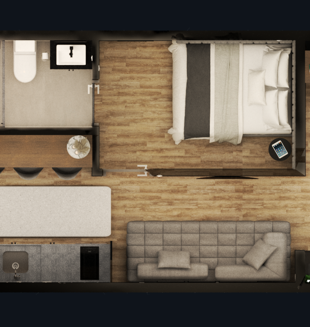 Planta baixa 3D de studio em Pinheiros com piso amadeirado, sofá cinza, cozinha integrada, cama de casal e área de trabalho