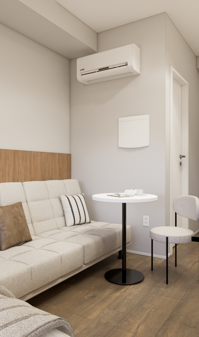 Render 3D de sala e quarto integrados, com sofá bege, mesa redonda, piso amadeirado, paredes cinza e iluminação neutra